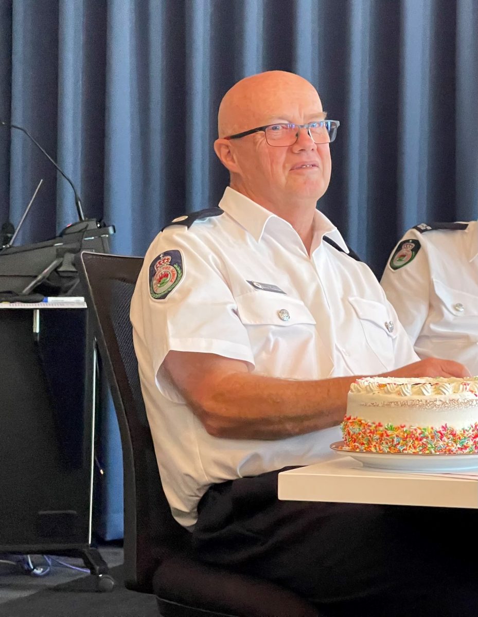 Firefighter with birthday cake
