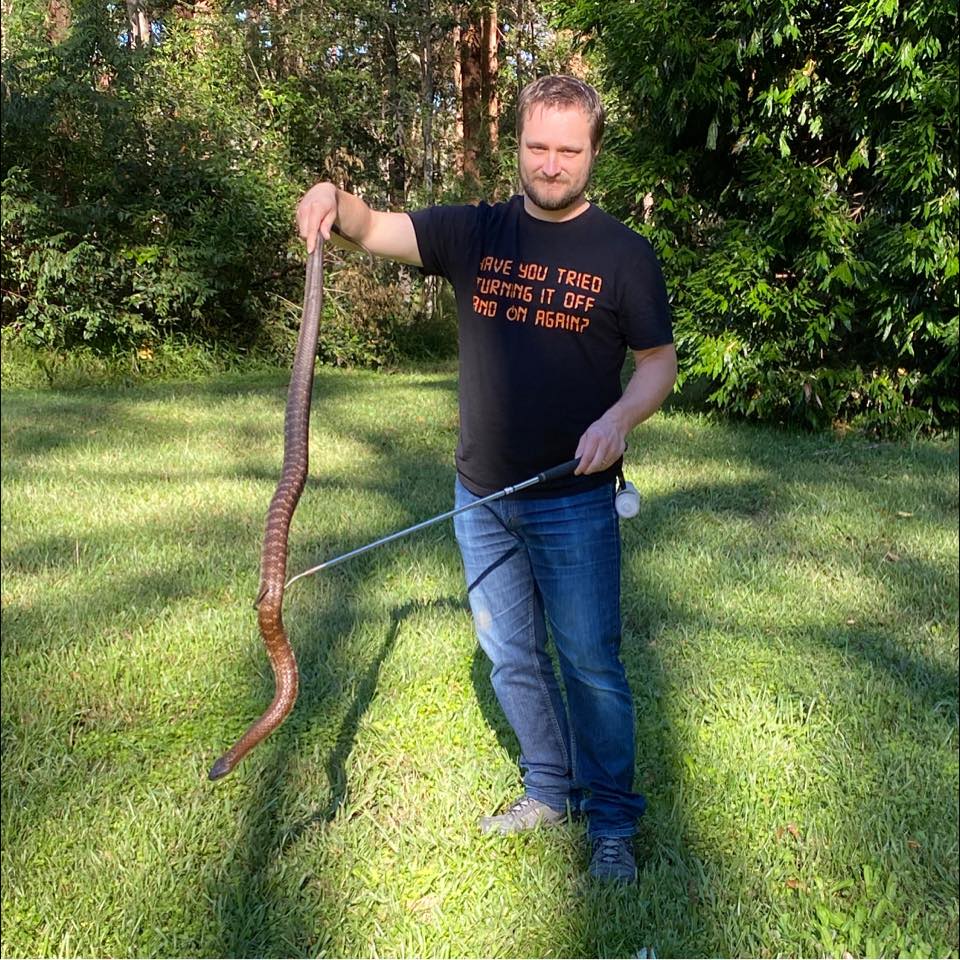 Ben Shoard holding a snake