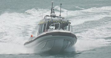 Four airlifted from rough seas after vessel capsizes north of Tathra
