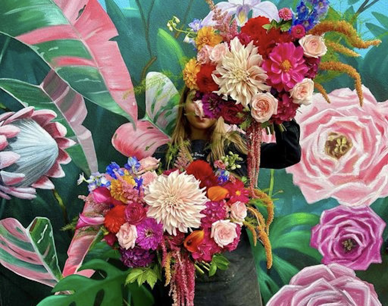 Jasmine Fleet with a bouquet of flowers