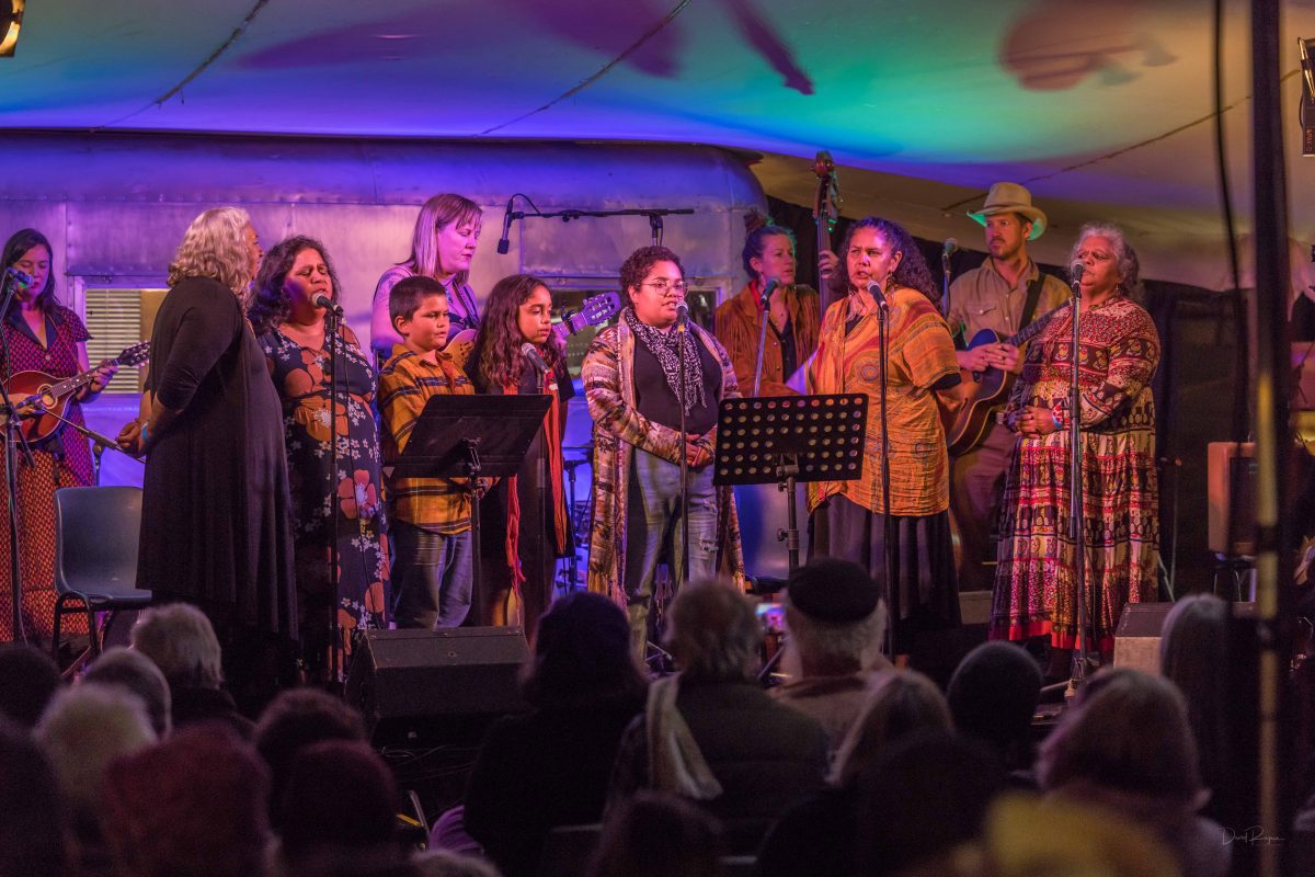 People singing on a stage