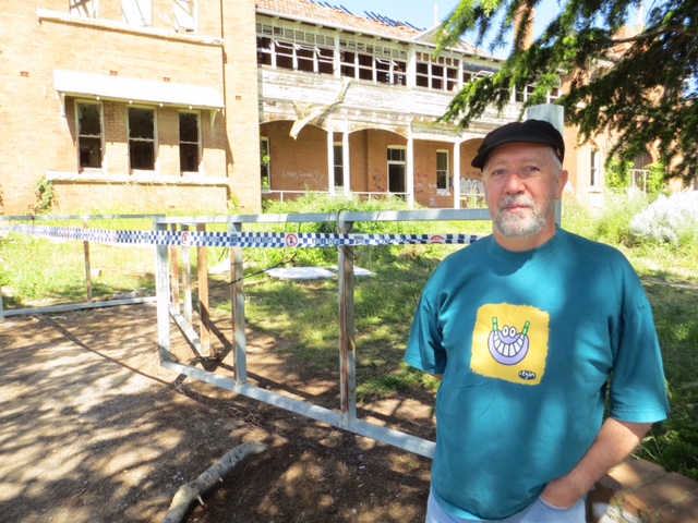 Ron McLaughlin outside the old orphanage