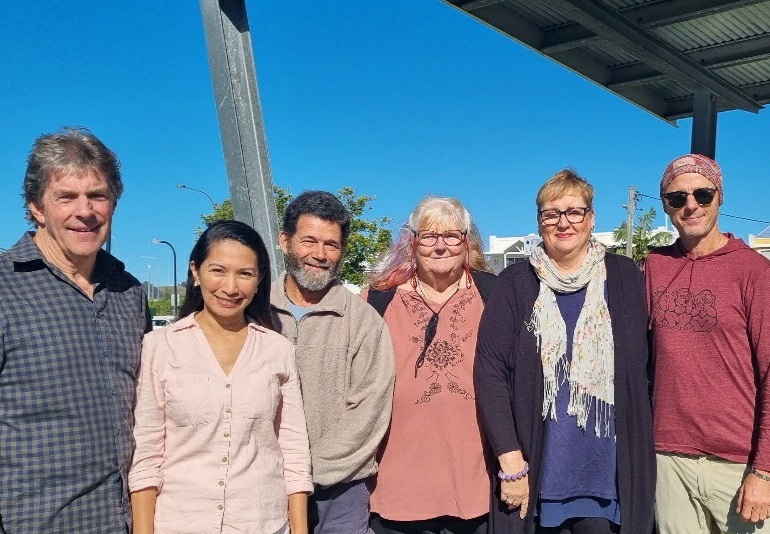 Batemans Bay Community Picnic volunteers Adrian Farrant, Sofia Keady, Paul Lombo, Cheryl Lombo, Trish Evans and Oliver Haas are the team behind the monthly event. Photo: Sofia Keady