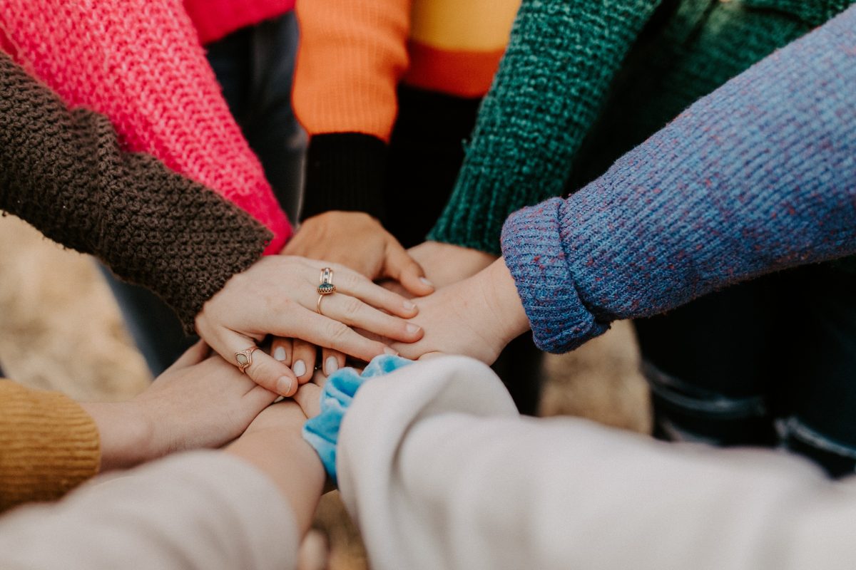 people joining hands