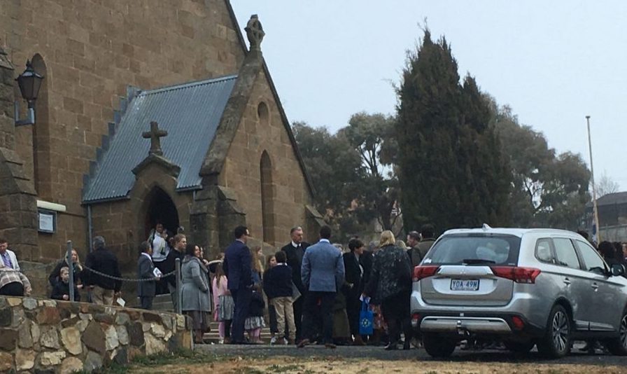 Crowd gathering outside church