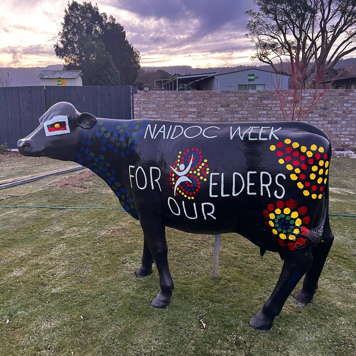 painted plastic cow display