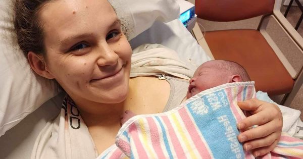 Baby George was born on the hospital kerb – his mum wouldn't have it any other way