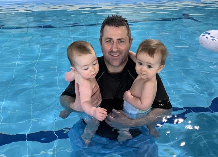 Pete and kids in pool.
