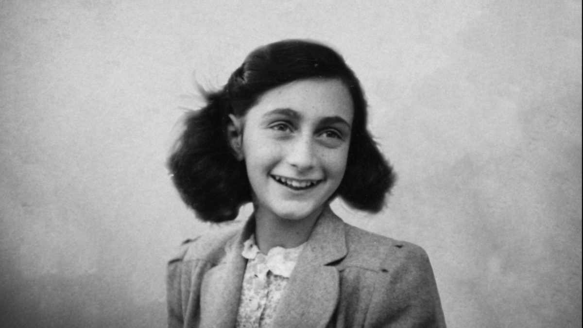 A black-and-white photograph of Anne Frank