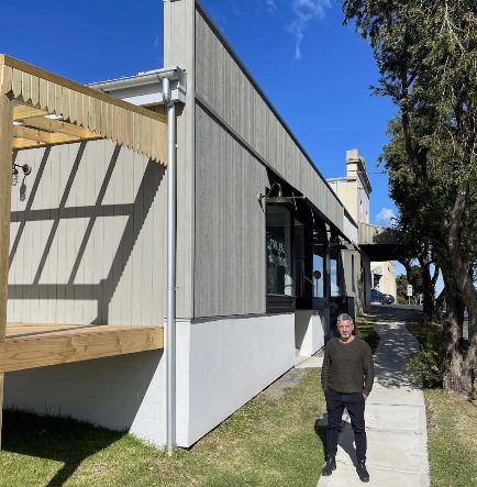 man at renovated building