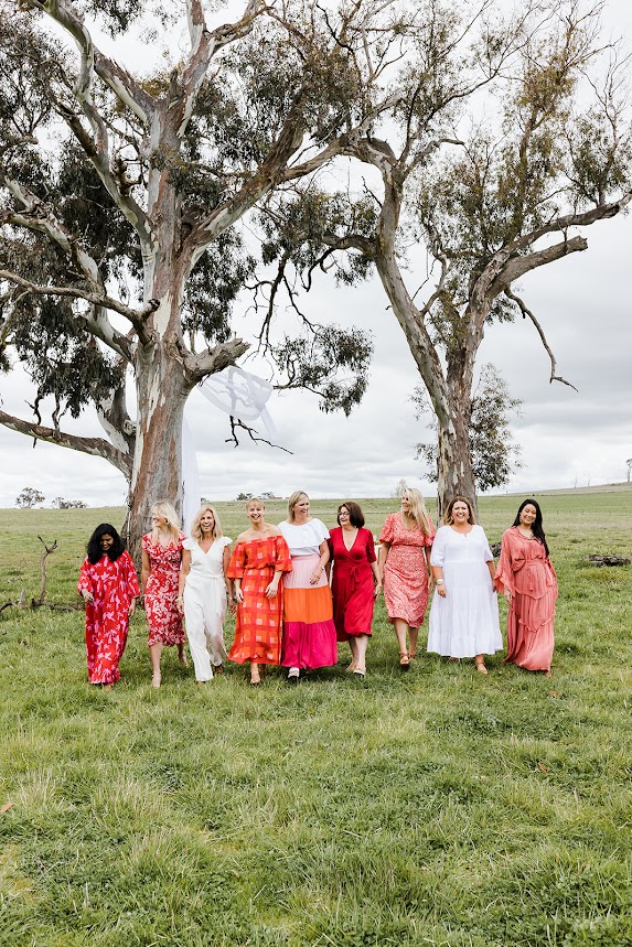 nine women walking in paddock