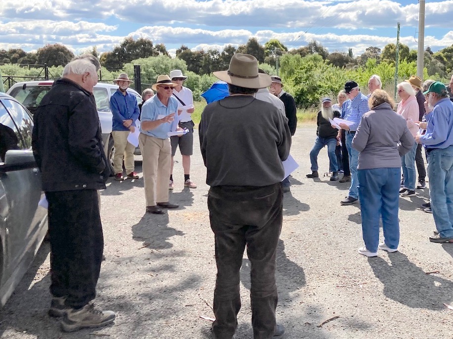 Ed Suttle with a group of investors on a tour of the site of Goulburn’s community solar farm