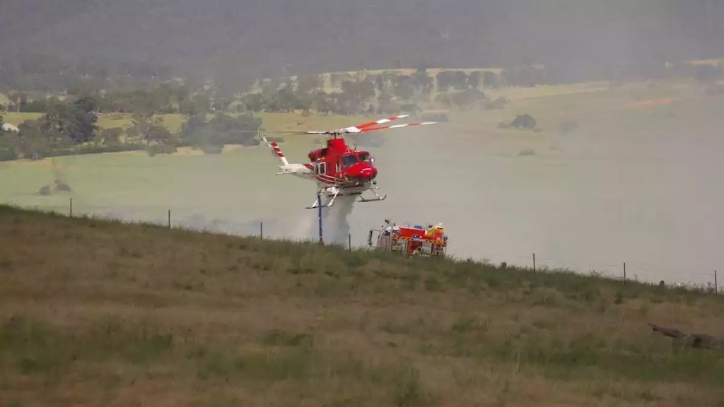 Helicopter fighting fire