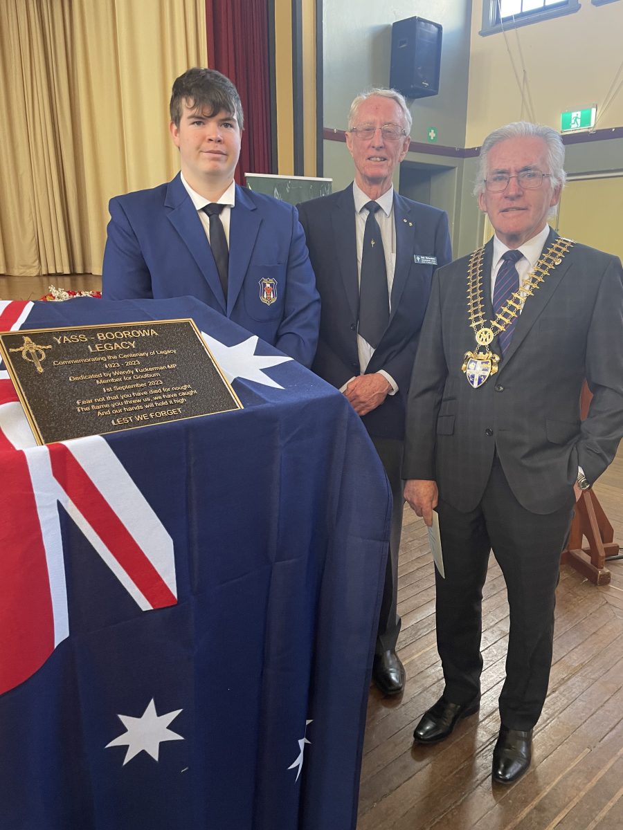 Sean Bell, left, who gave the Welcome to Country, Legacy chairman Bob Richardson and the Mayor of Yass, Allan McGrath with the plaque.