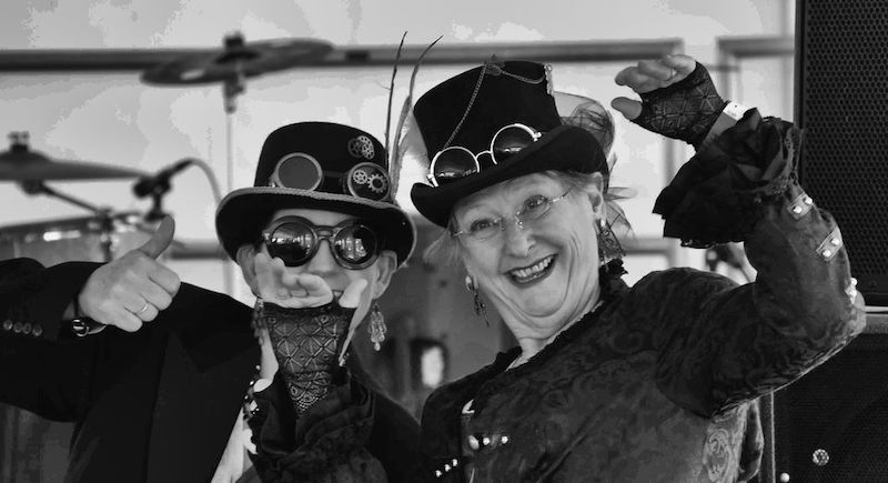 Black-and-white photo of two people in costume