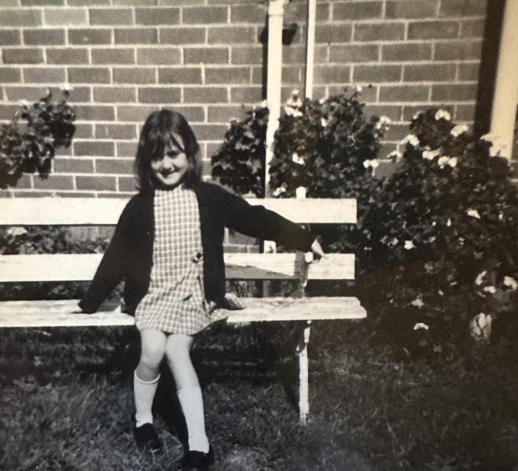 Steve Hazelton’s sister Margaret on a bench seat in the garden at 21 Hurst Street, Goulburn
