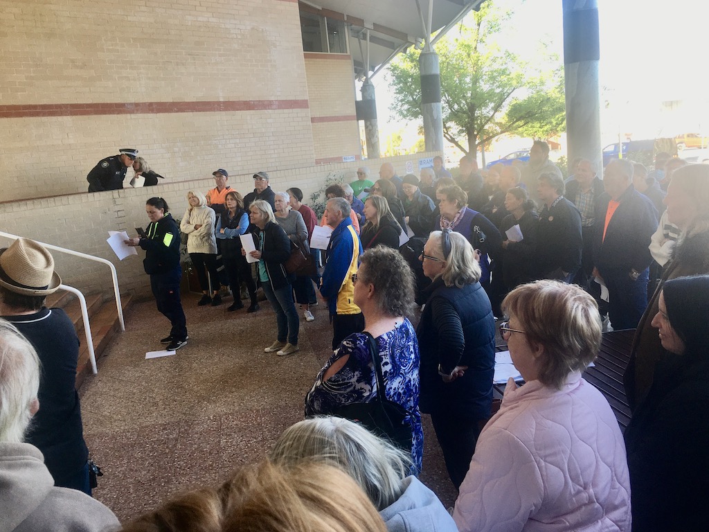 Some of the crowd of more than 50 people outside the Goulburn Mulwaree Civic Centre on Tuesday opposed to the rate hike in 2024-25. 