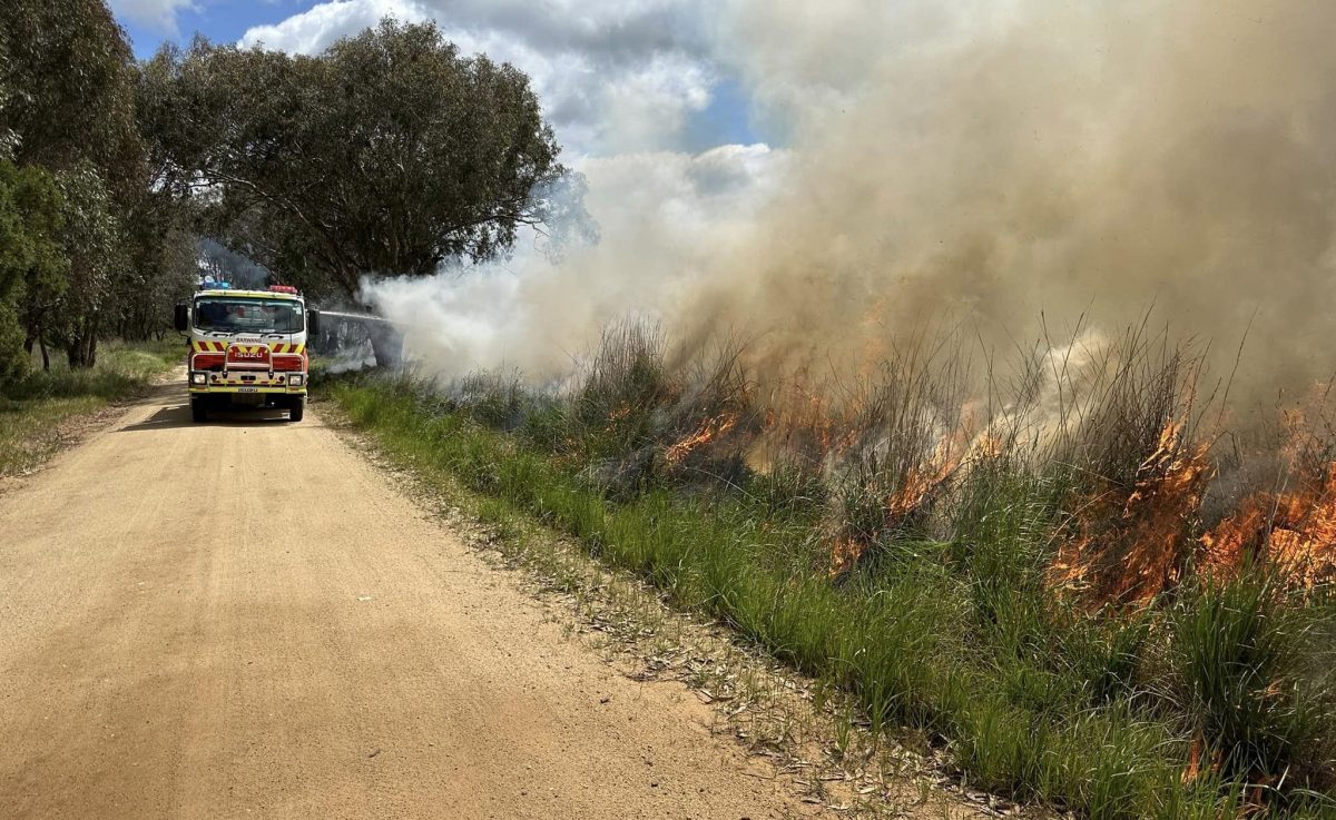 NSW Rural Fire Service tanker attending to a roadside fire
