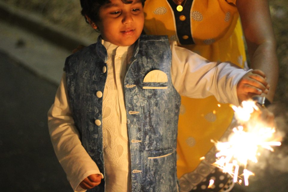 A child holding a sparkler