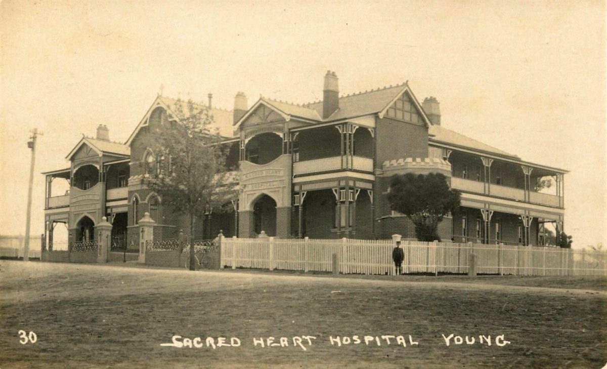 Old 1900s photo of Sacred Heart Hospital at Young.