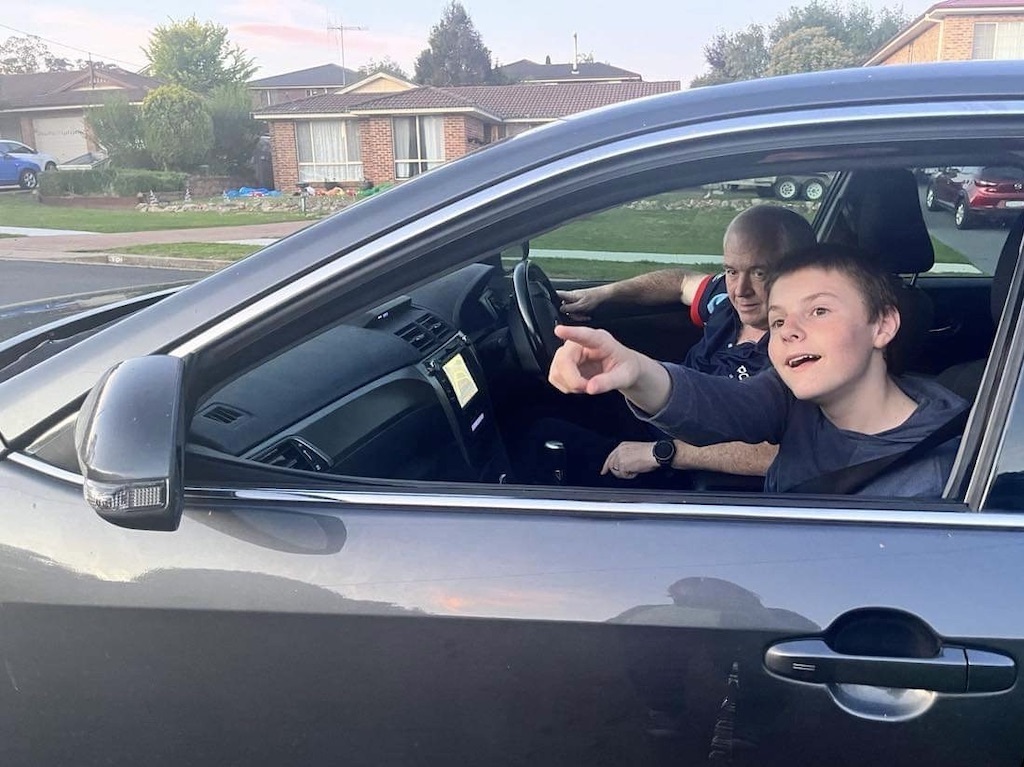 Bobby and his father Chris Gordon adding to their Google Maps program: Goulburn Christmas lights.