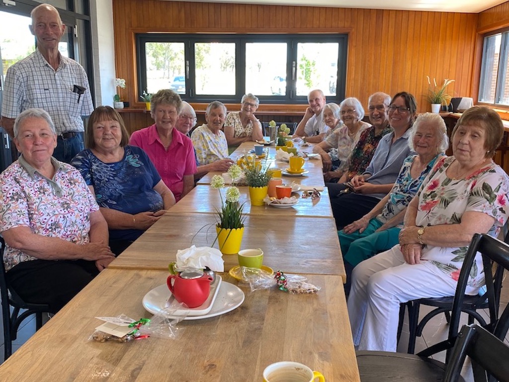 group of people at lunch celebration