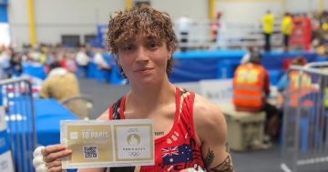Queanbeyan boxer Monique Suraci is off to the Paris Olympics after winning her qualifying bout in the Solomon Islands