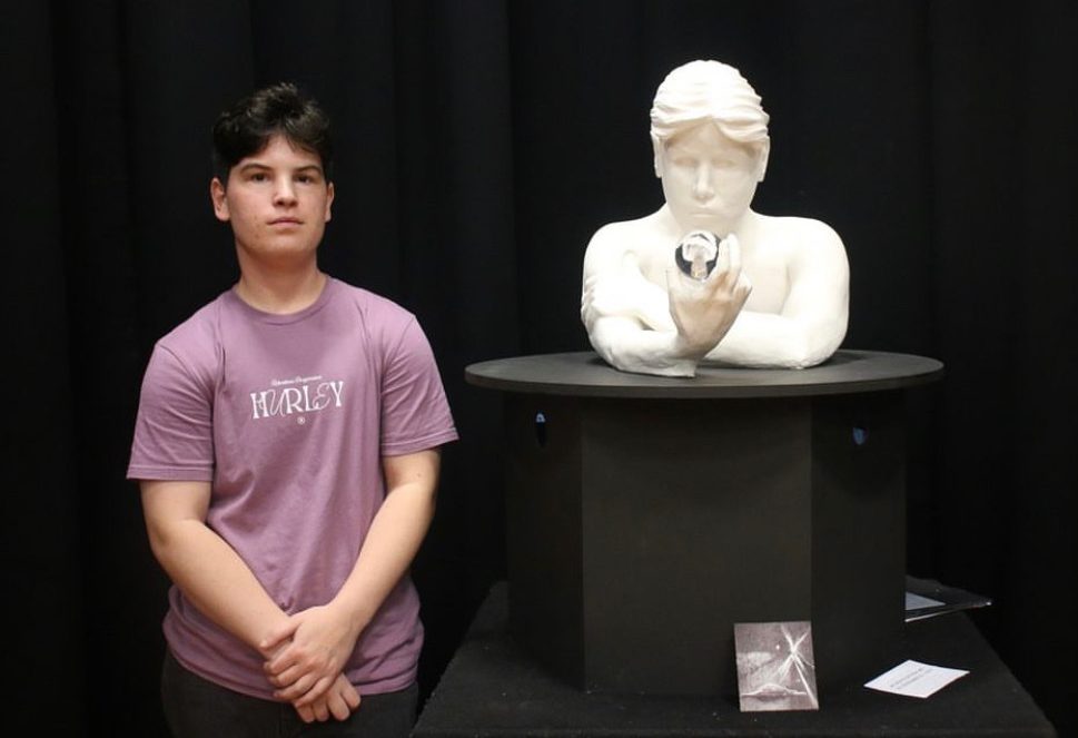 Student with sculpture