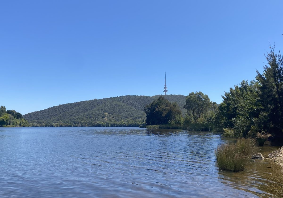 Lake with a phone tower in the background