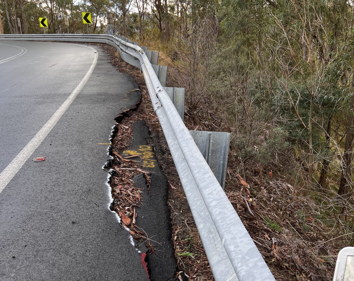 brown mountain snowy mountain highway landslip landslide