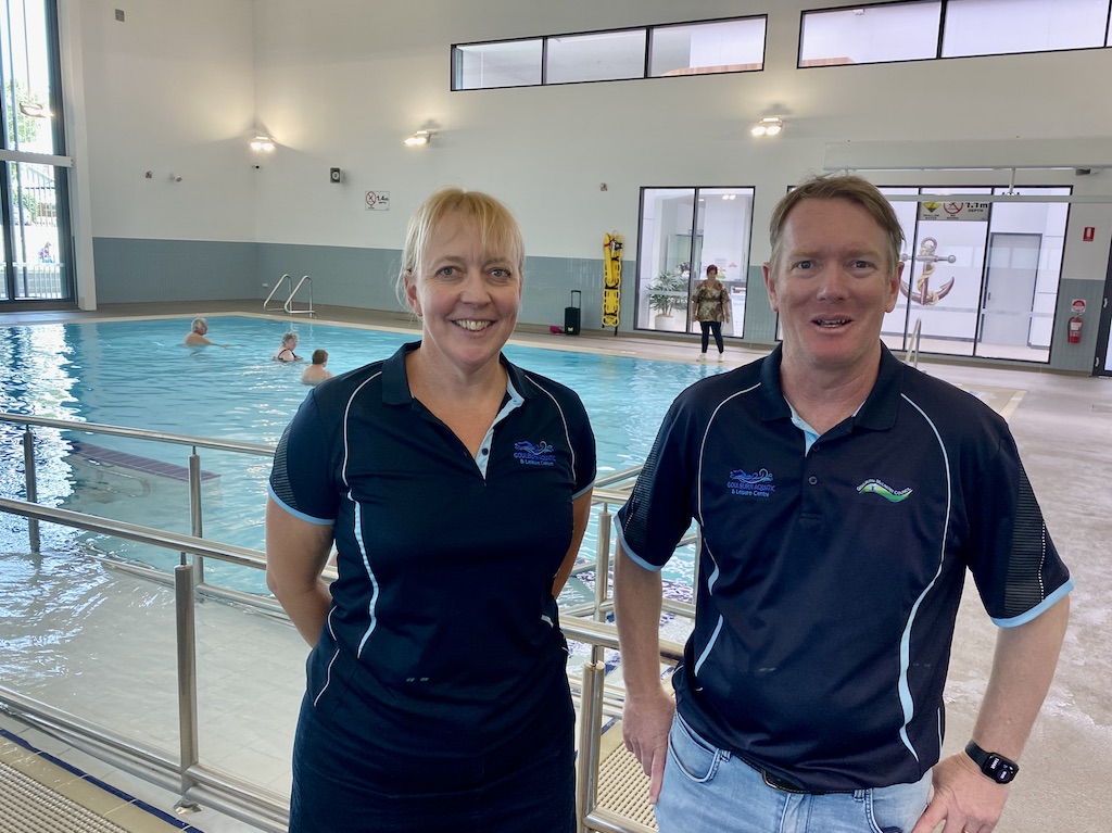 Goulburn Aquatic and Leisure Centre manager Belinda Hall and acting operations director Rob Hughes on the edge of the warm water pool, which is in high demand.
