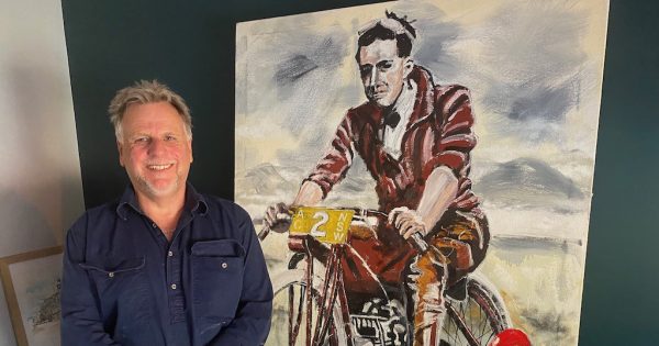 Signwriter leaves his Marks with bands, bikes and brush