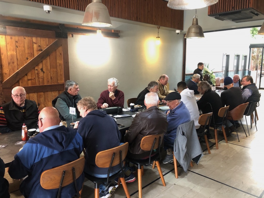 Men at a long table