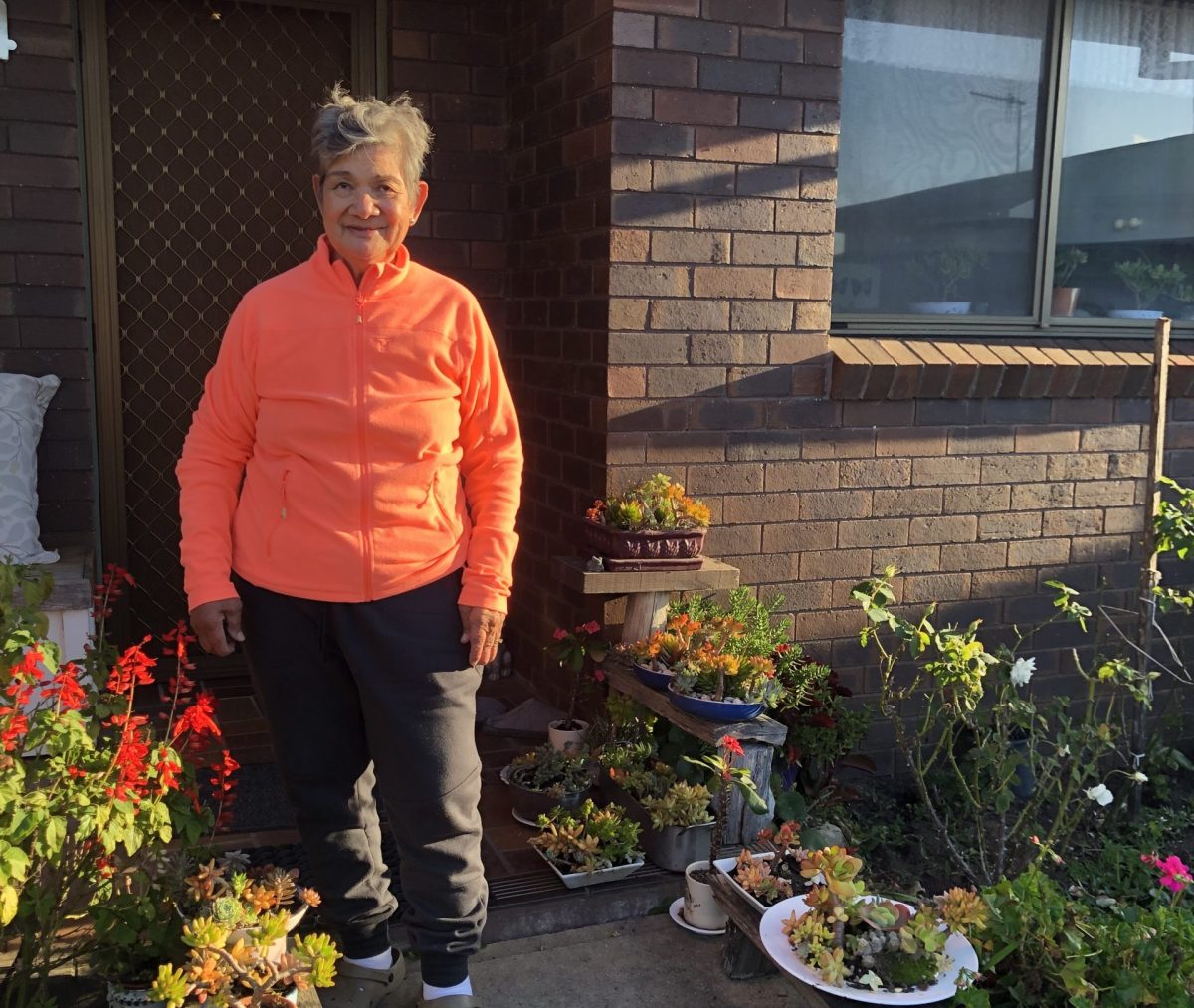 One of the tenants of the existing four units, Nieves Cridland, with the succulents she has grown in her garden.