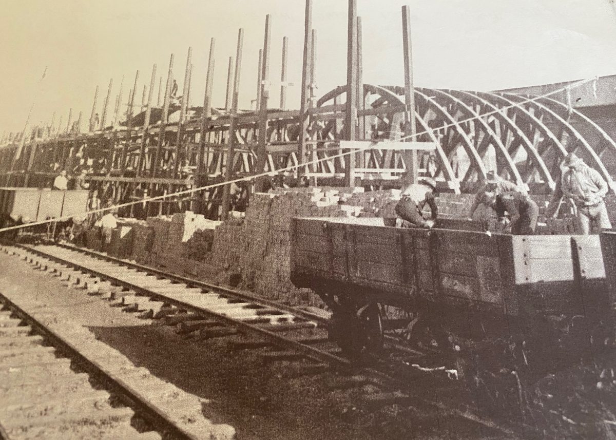 Labourers preparing viaduct formwork and bricks circa 1913