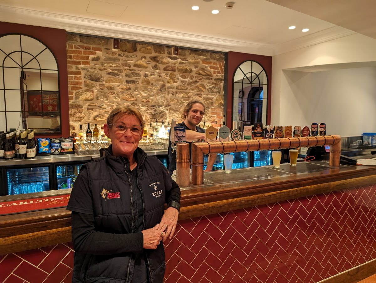 Two bar staff at a pub