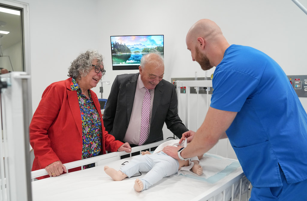 Former Head of the ANU Rural Clinical School Amanda Barnard with the Member for Macarthur Dr Mike Freelander and third year medical student Samuel Walterlin in a high fidelity simulation lab in the Amanda Barnard Clinical Training Facility at Goulburn Base Hospital