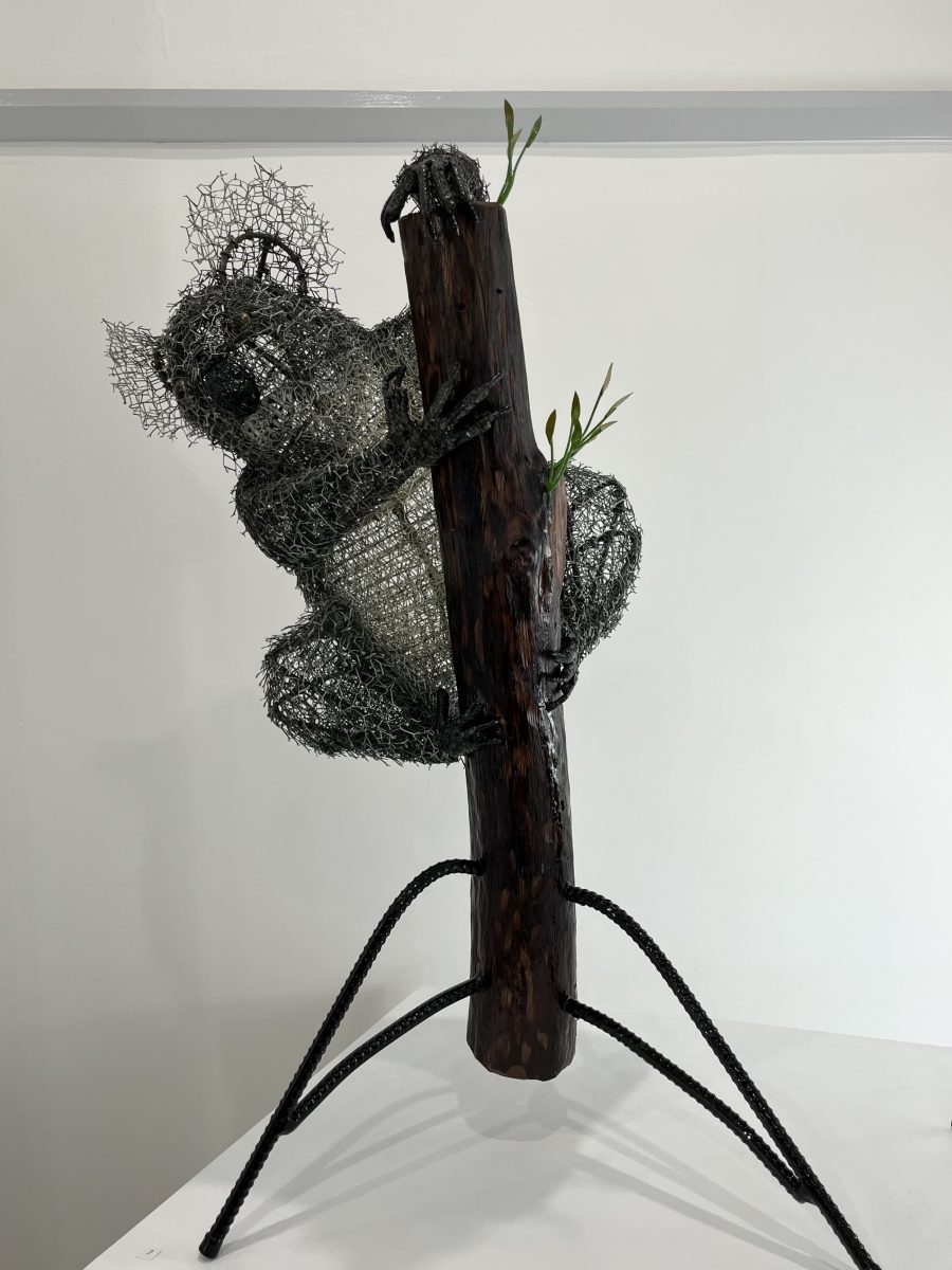 Koala on branch sculpture