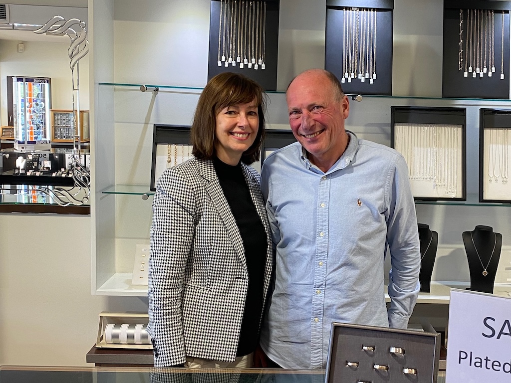 a woman and a man in their jewellery store