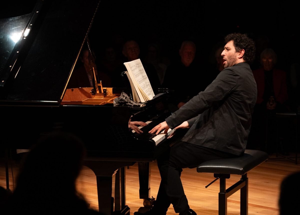 Stefan Cassomenos played the piano in the centre of Four Winds' Windsong Pavilion