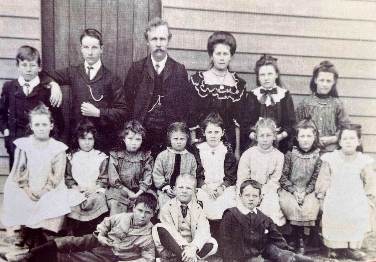 Old black-and-white image of formal school photo