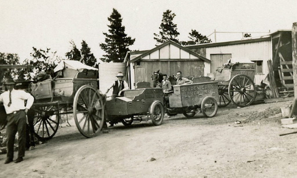 men with horse-drawn carts used for bread delivery