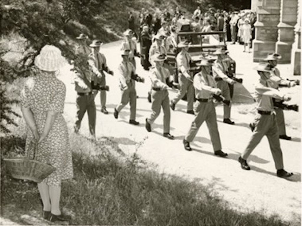 Following the death in South Vietnam of Private Ray Cox on 28 December 1968, a funeral procession, with the coffin on the gun carriage, moves out of St Saviour's Cathedral, Goulburn.