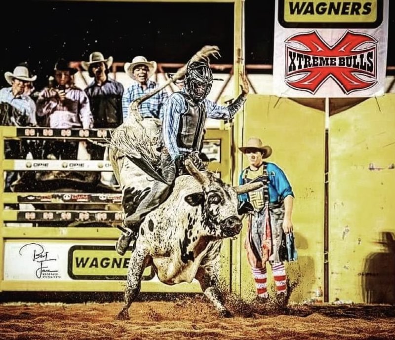 Man on bucking bull