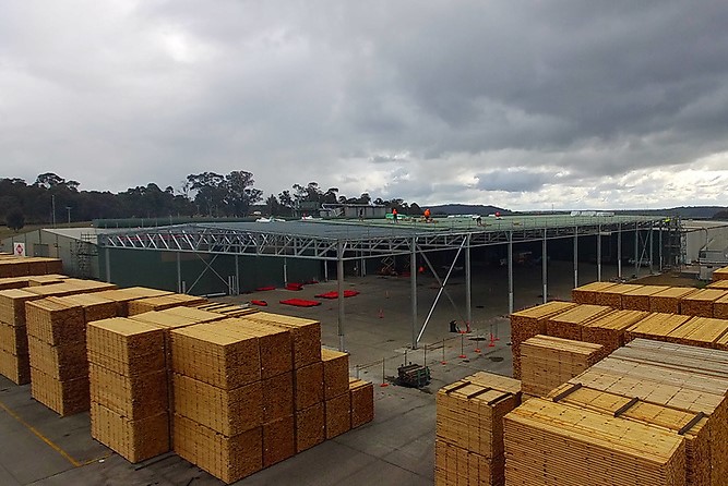 timber mill storage shed under construction