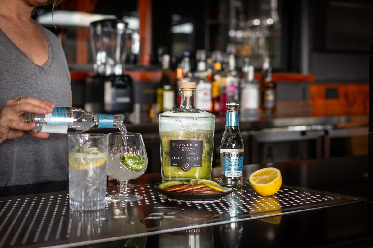 Drinks being poured at the bar.