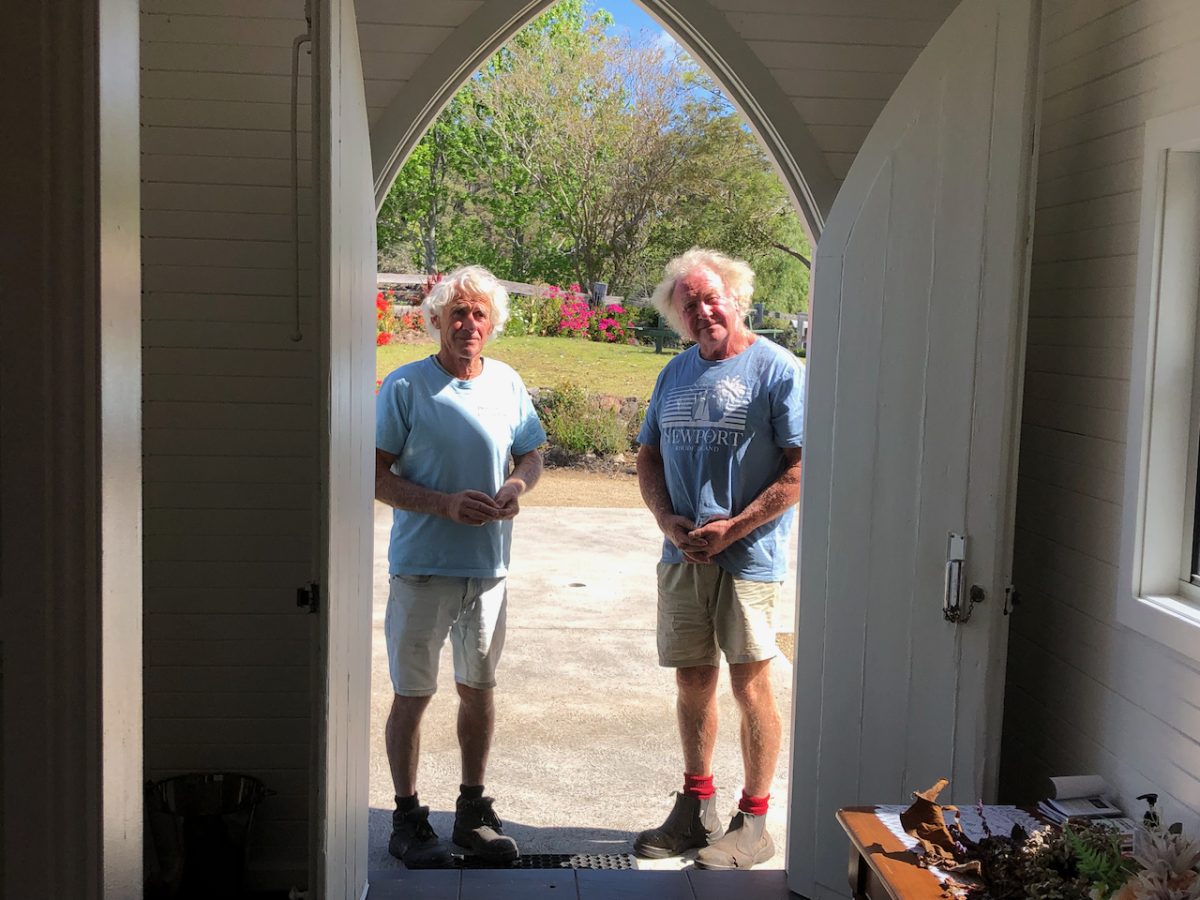 two men in a doorway