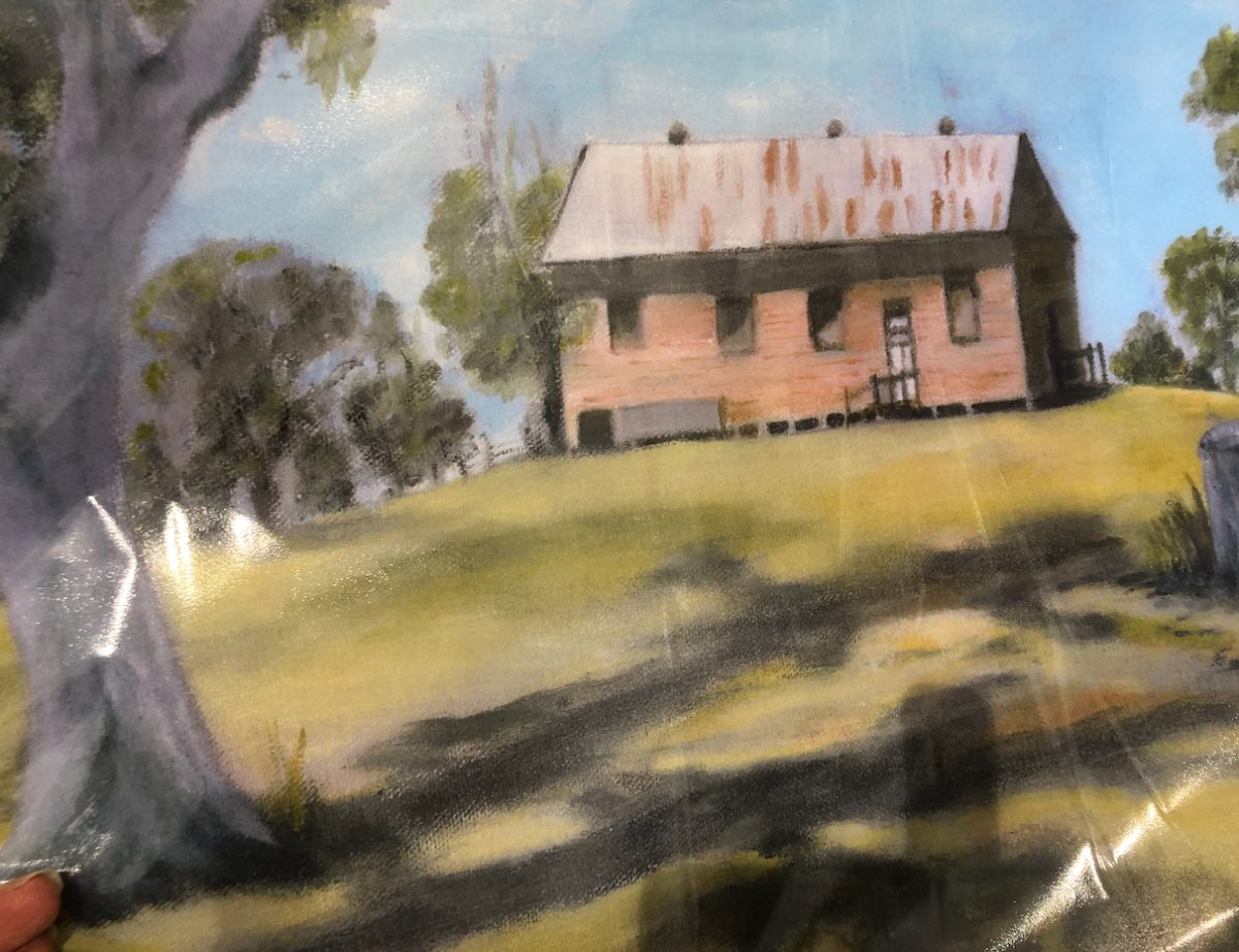 A painting of the old Wandella Community Hall that was destroyed in the Black Summer bushfires. 