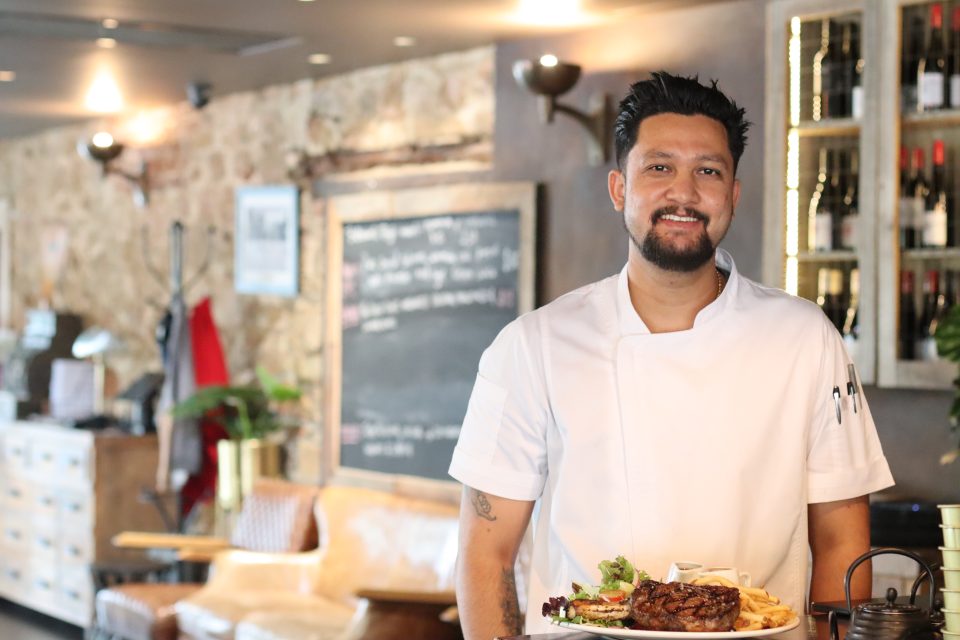 Executive Chef at The George Bar and Dining Bigyan Bohara with the award winning cuttlemans cutlet.