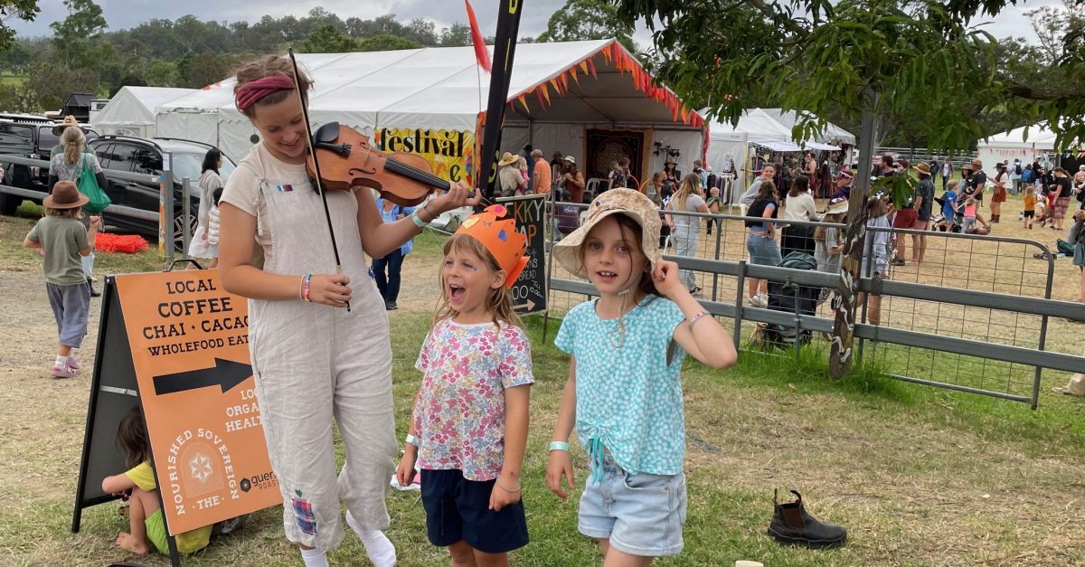 A young family of buskers at the 2024 Cobargo Folk Festival. 